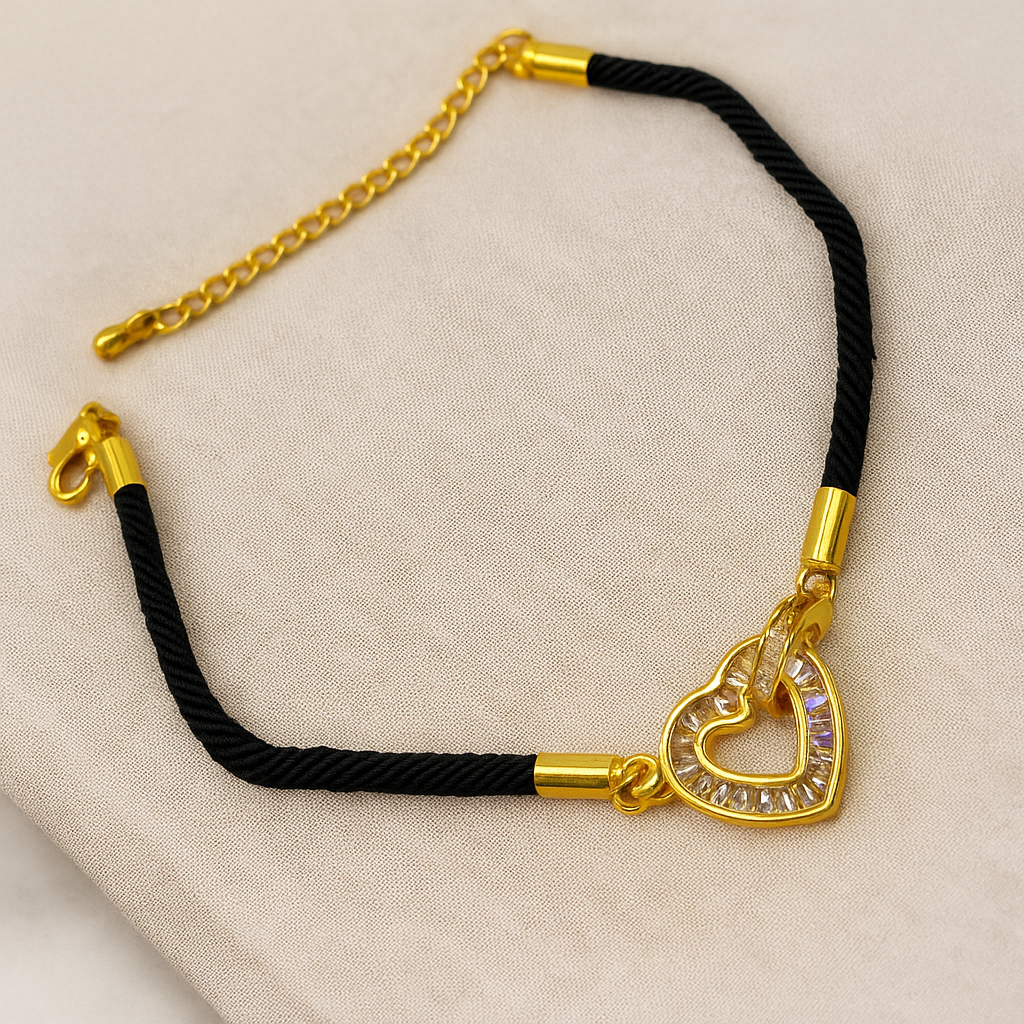 إسواره لون ذهبي مع شريط ناعم أسود