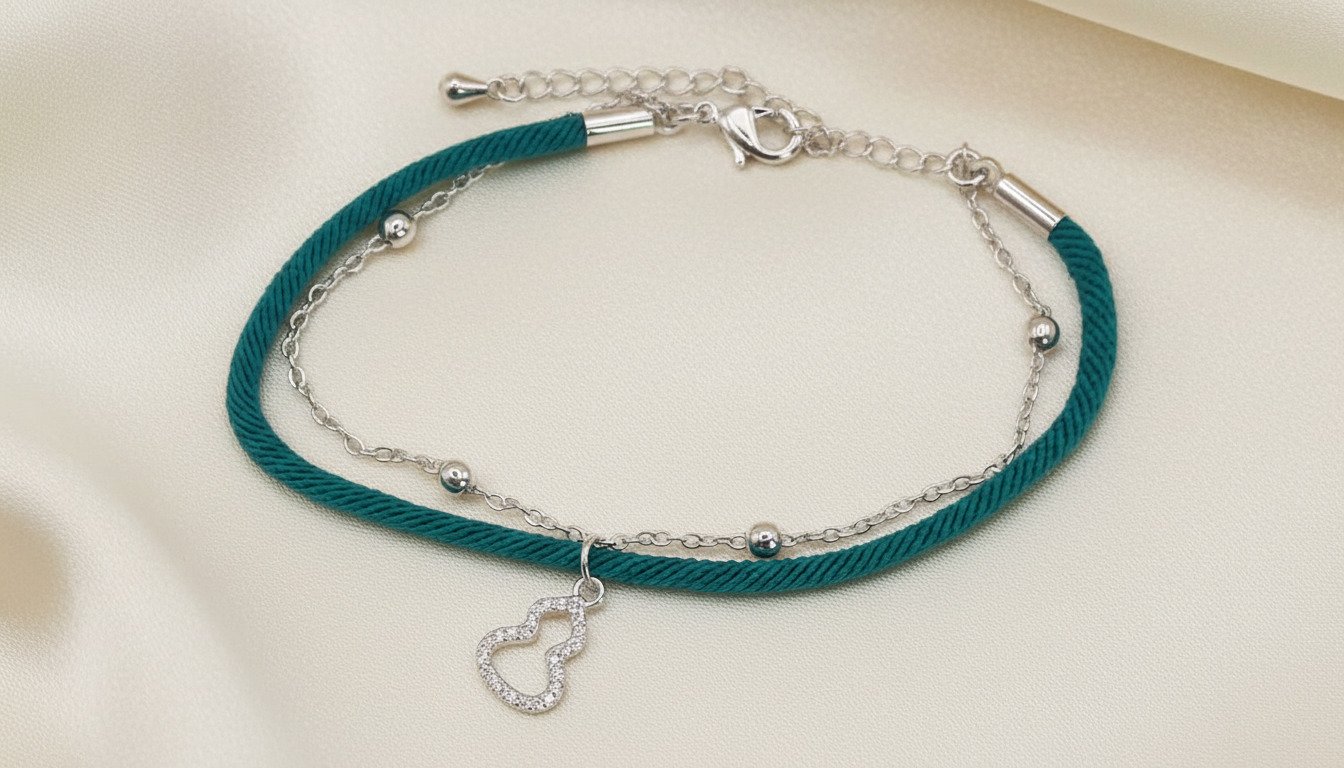 اسوارة خيط أخضر  بلمسة فضية